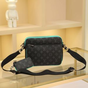 Crafted from Monogram Eclipse canvas and Monogram Eclipse Reverse canvas. The signature tonal gray pattern accentuates the lines of this versatile hybrid design. Beyond functioning as a traditional crossbody bag, it includes a detachable zippered pouch and a coin purse attached to the strap. Dimensions: 25.0 x 18.5 x 7.0 cm